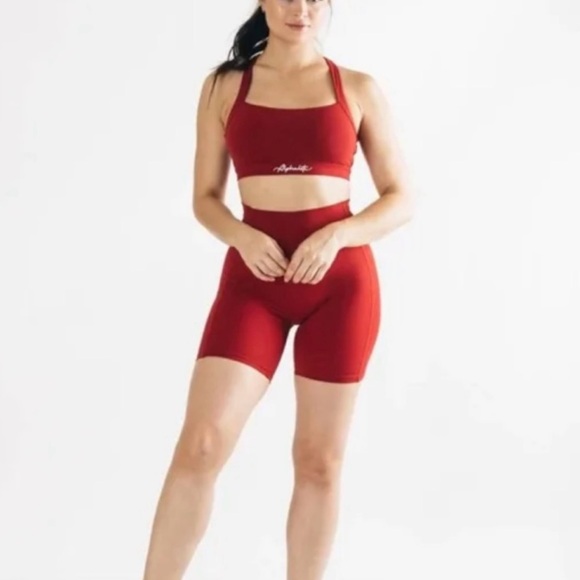 Alphalete Pants - Alphalete pulse kinetic biker shorts- red